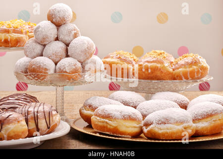 Many different types of donuts cakes on Fat Thursday Stock Photo