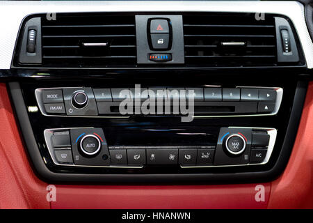 Car instrument panel console and stereo radio with air condition panel in car. Stock Photo