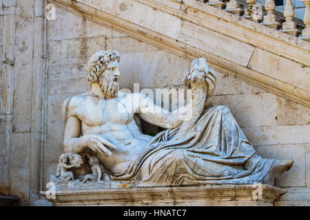 Statue of god ( Tiber ) with cornucopia at square Piazza del Campidoglio Stock Photo