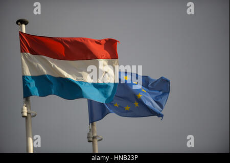 Luxembourg 17.11.2008, view of Luxembourg national flag next to European flag in the old Town Stock Photo