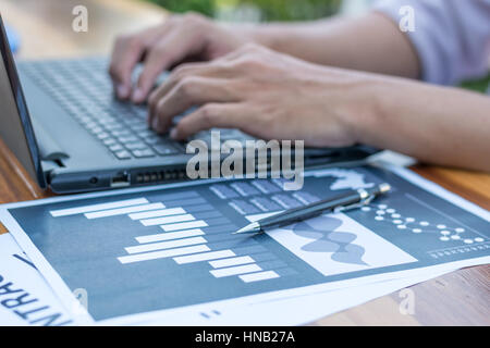 business technology concept,Business people hands use laptop connection online networking communication on table ,selective focus. Stock Photo