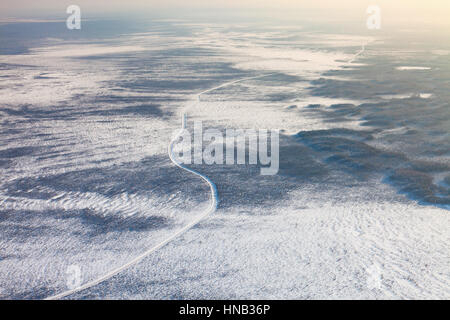 winter road on the frozen bogs of Western Siberia, top view Stock Photo