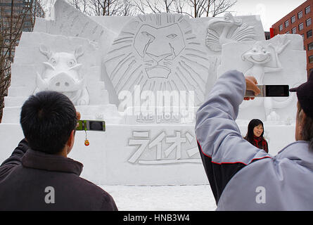 Sculpture,Visitors,Sapporo snow festival, snow sculpture,Odori Park,Sapporo, Hokkaido, Japan Stock Photo