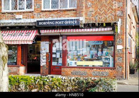 A Post Office and Butchers shop in the Norfolk Broads village of Horning, Norfolk, England, United Kingdom. Stock Photo