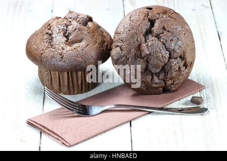 chocolate muffins on wooden background Stock Photo
