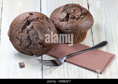 chocolate muffins on wooden background Stock Photo