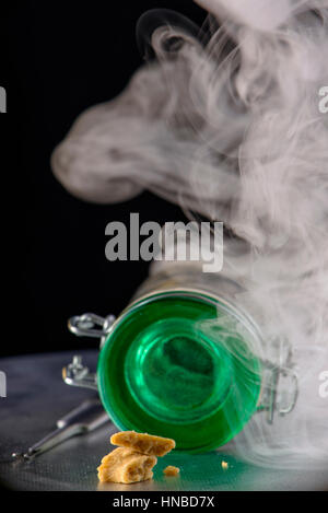 Marijuana extraction concentrate aka wax crumble on a glass rig ...