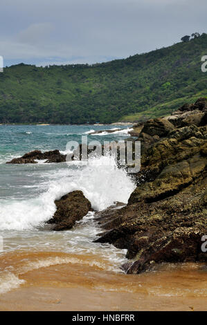 The coast of Phuket Island consists of sandy beaches inbetween rocky crags and outcrops, Thailand Stock Photo