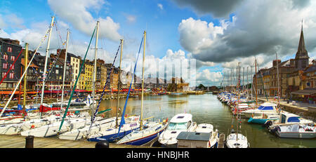 Honfleur famous village harbor skyline, boats and water. Normandy, France, Europe. Stock Photo