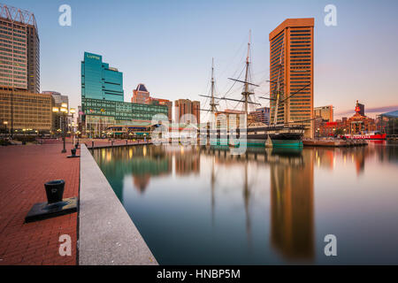 The Baltimore skyline and USS Constellation, at the Inner Harbor, in Baltimore, Maryland. Stock Photo