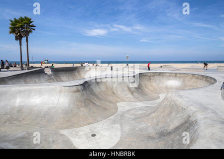 Los Angeles, California , USA - June 20, 2014:  Concrete ramps and ocean views at the popular Venice beach skateboard park. Stock Photo