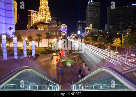 Las Vegas, Nevada, USA - October, 6th 2010:   The Eiffel Tower, Planet Hollywood and other landmarks entertain tourists on a warm desert night.