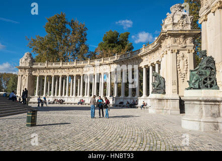 Madrid, Spain - November 13, 2016: Tourist visiting Alfonso XII monument on November 13, 2016 in Retiro park, Madrid, Spain. Stock Photo