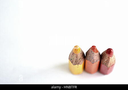 Three small colored pencils Stock Photo