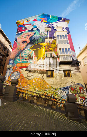 Vitoria, Spain - March 5, 2016: The Painted houses with  artistic graffitties murals it’s a touristic attraction in the city of Vitoria, Basque Countr Stock Photo