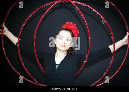 Blackpool, Lancashire. 11th February 2017.  Ms. Polly Hoops opens the fabulous ‘Showzam’ festival with her five hula hoop performance at The Winter Gardens in Blackpool. Polly has been performing since the age of three and has a background in ballet and a degree in Drama & Theatre Arts from Goldsmiths University of London.  Back for its 10th year the festival is packed with magic & street theatre all over the famous north west town.  Credit: Cernan Elias/Alamy Live News Stock Photo