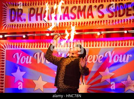 Blackpool, Lancashire, UK. 11th February 2017. Roll up! Roll up!! 'SHOWZAM' Festival sideshow returns to Blackpool, Lancashire.   Dr. Phantasma's fire spectacular show performed at the Winter Gardens, Blackpool.  Back for its 10th year the festival is packed with magic, sideshows & street theatre all over the famous north west town.