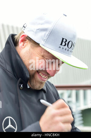 Gosport, Hampshire, UK. 11th February 2017. Alex Thomson arriving back in his home town of Gosport on board HugoBoss after finishing second in the Vendee Globe around the world solo,non-stop, race in 74 days.During the race he broke the world 24 hour distance record sailing 536nautical miles in 24 hours and beat his own British 80 day record tobecome the fastest Briton to sail around the world solo, non-stop in amonohull.A parade of sail was held in his honour together with a civic reception. Credit: Wendy Johnson/Alamy Live News Stock Photo