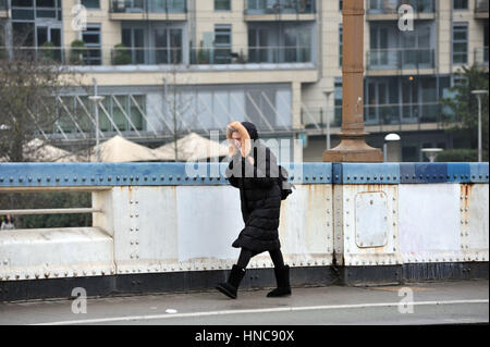 London, UK. 11th February 2017. On Wandsworth Bridge.Chilly Saturday in Wandsworth on the Thames. Credit: JOHNNY ARMSTEAD/Alamy Live News Stock Photo