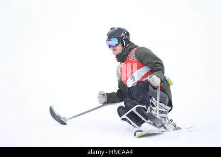 Ontario, Canada. 11th February 2017. The Ontario Parasport games Alpine skiing event was held Bolar Mountain on Saturday Feb 11 2017.  Athletes with physical disabilities competed in standing and on sit-skis, Also the visually impaired Athletes skied down with a guide skier. All 9 competitors went down the hill 2 times, Some athletes reaching speeds of 100 kph. The Ontario Parasport Games offers an opportunity to showcase this sport and inspire others to get involved. Credit: Luke Durda/Alamy Live News Stock Photo