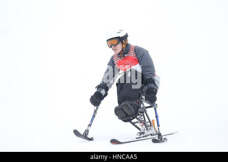 Ontario, Canada. 11th February 2017. The Ontario Parasport games Alpine skiing event was held Bolar Mountain on Saturday Feb 11 2017.  Athletes with physical disabilities competed in standing and on sit-skis, Also the visually impaired Athletes skied down with a guide skier. All 9 competitors went down the hill 2 times, Some athletes reaching speeds of 100 kph. The Ontario Parasport Games offers an opportunity to showcase this sport and inspire others to get involved. Credit: Luke Durda/Alamy Live News Stock Photo