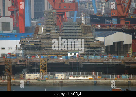 Dalian, LIAONING PROVINCE, CHINA. 8th Feb, 2017. China's second aircraft carrier, currently called the 001A, is under construction in the port city of Dalian in Liaoning Province, on February 8, 2017. China's state-run media reported its first home-made carrier could start patrolling the contentious South China Sea by 2019 to handle ''complicated situations'' with Washington. Credit: Stephen Shaver/ZUMA Wire/Alamy Live News Stock Photo