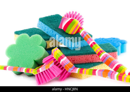 Colorful sponges and brushes isolated on white background. Stock Photo