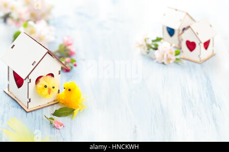 White Wood houses with colorful heart shaped windows. Stock Photo
