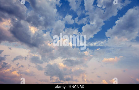 Dramatic colorful cloudscape, evening sky background texture Stock Photo