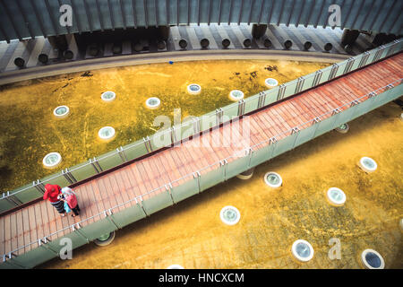 Two Muslim women are visiting Banda Aceh Tsunami Museum. Stock Photo