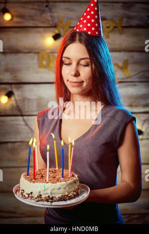 Girl Holding Birthday Cake With Candle At Home Stock Photo - Alamy