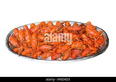 Red boiled crawfishes on the table in oval dish Stock Photo