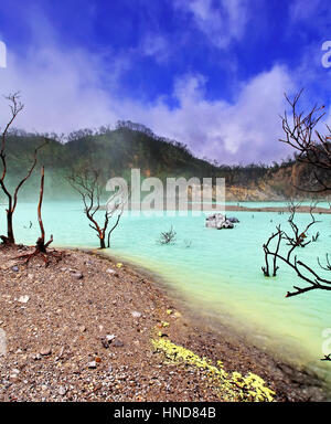 Kawah Putih, also known as White Crater, is a natural sulfur rich volcanic lake in West Java, Indonesia Stock Photo