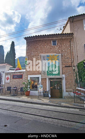 SOLLER, MALLORCA, BALEARIC ISLANDS, SPAIN - SEPTEMBER 28, 2016: Soller deli store and railway tracks on September 28, 2016 in Soller, Mallorca, Balear Stock Photo