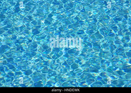 Light refractions in swimming pool Stock Photo