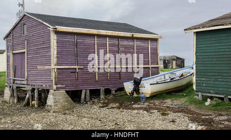 Fishing shacks and boat, Parson's Pond, Newfoundland Stock Photo