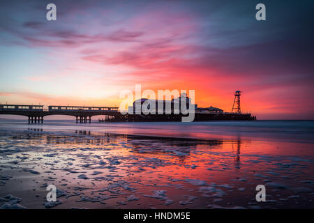 Sunrise at Bournemouth Pier in Dorset England Stock Photo