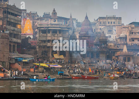 Landscape, panorama,panoramic,Manikarnika Ghat, the burning ghat, on the banks of Ganges river, Varanasi, Uttar Pradesh, India. Stock Photo