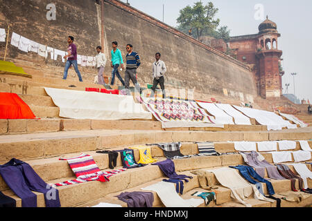 incidentally people and laundry drying, Dasaswamedh Ghat, in Ganges river, Varanasi, Uttar Pradesh, India. Stock Photo