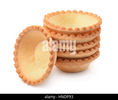 Stack of empty tart shells isolated on white Stock Photo