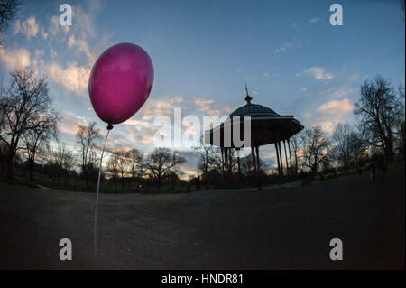 Clapham Common bandstand and a pink helium balloon Stock Photo