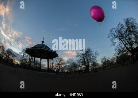 Clapham Common bandstand and a pink helium balloon Stock Photo