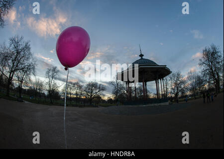 Clapham Common bandstand and a pink helium balloon Stock Photo