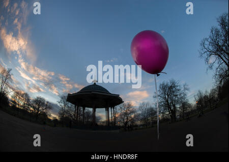 Clapham Common bandstand and a pink helium balloon Stock Photo