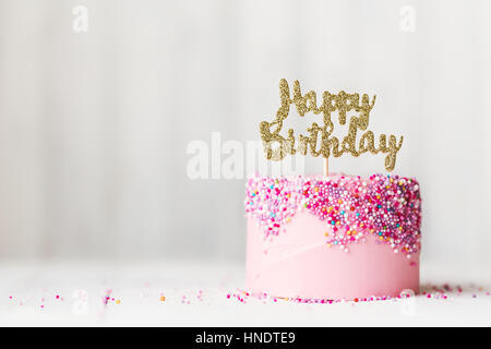 Birthday cake with sparkly banner Stock Photo