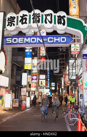 Biking, bike, street scene, cityscape, Soemoncho street, Dotombori,Osaka, Japan,Asia,Osaka, Japan,Asia Stock Photo