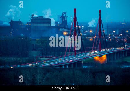 Autobahn, highway bridge of the A42, over the Rhine near Duisburg Beeckerwerth, Thyssenkrupp Steel steelworks, blast furnaces, Germany, Stock Photo