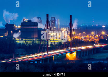 Autobahn, highway bridge of the A42, over the Rhine near Duisburg Beeckerwerth, Thyssenkrupp Steel steelworks, blast furnaces, Germany, Stock Photo