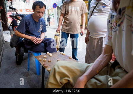 Street scene, Playing chinese chess in Travessa do Matadouro,Macau,China Stock Photo