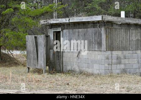 Old abandoned bathroom at a park Stock Photo